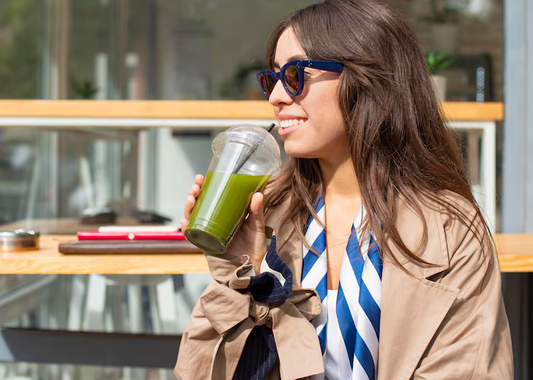 women drinking green juice to symbolize the blog does green powders actually work