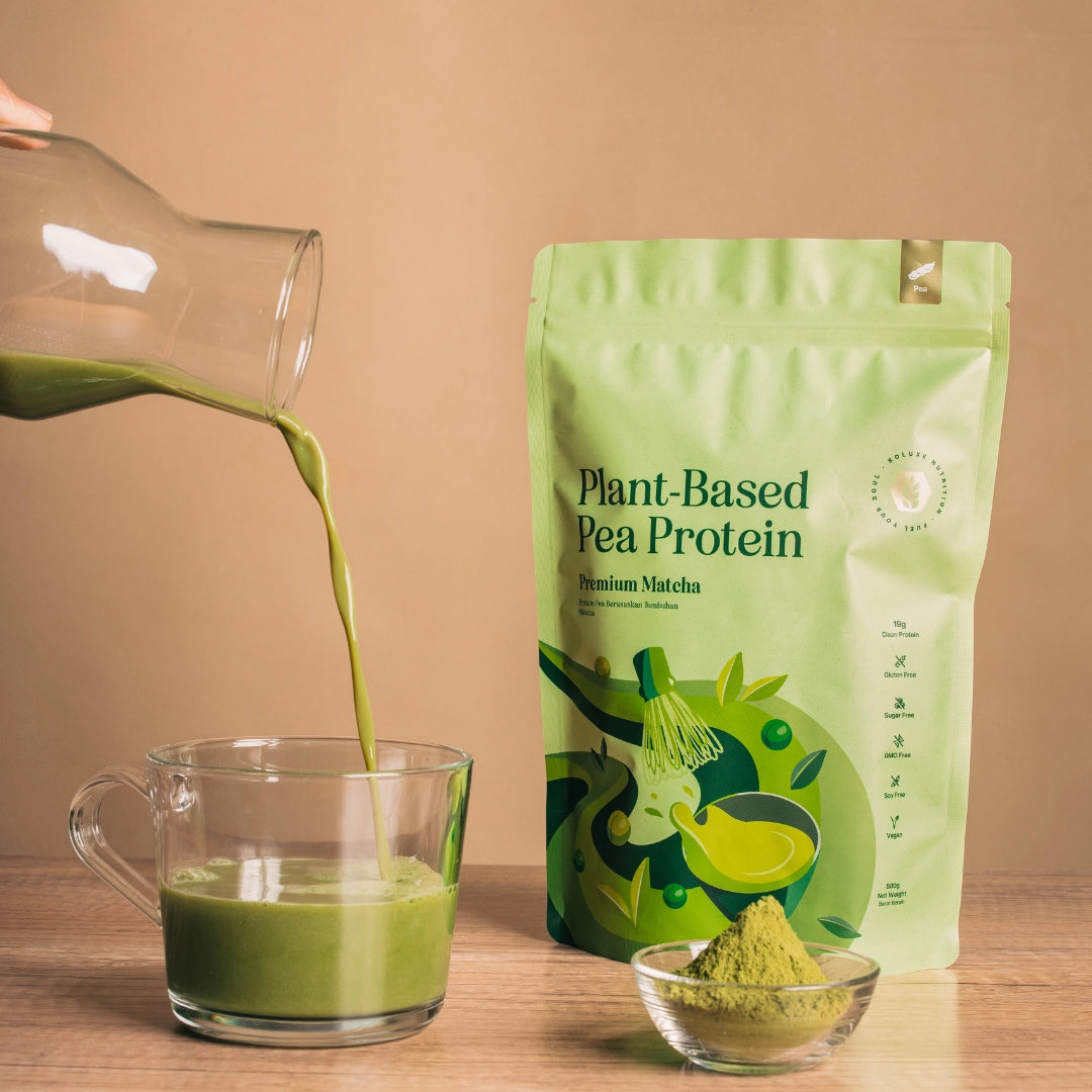 Pea protein powder in matcha flavour and jar pouring protein powder into a glass