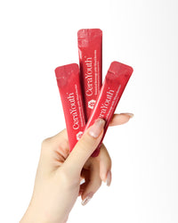 three sachet of cerayouth hold by hand